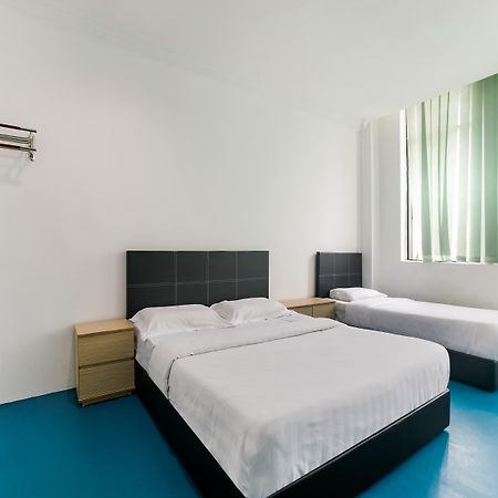 SPOT ON 89726 Capsule Inn Kota Kinabalu Exterior foto