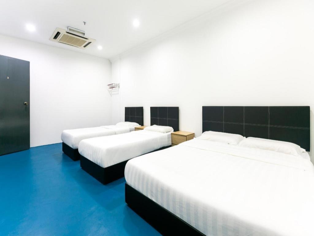 SPOT ON 89726 Capsule Inn Kota Kinabalu Exterior foto